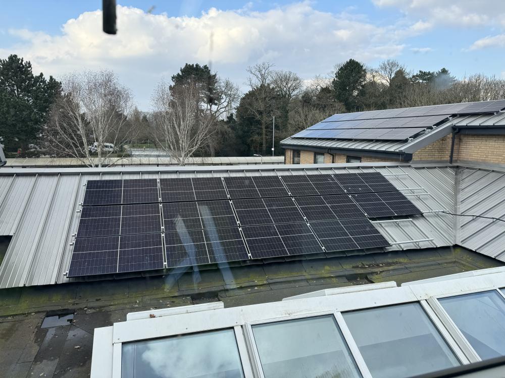 Solar pv installation on the roof at Parrs Wood High School