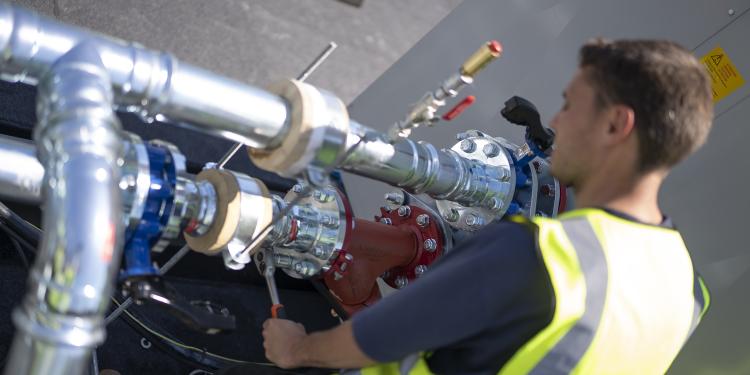 Man working on pipes