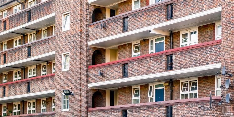 Red brick housing block with balcony's