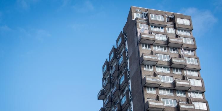 Housing block of flats against a blue sky