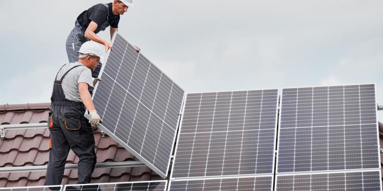two men mounting roof solar 