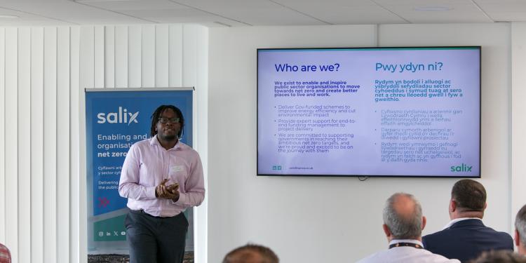 Gbenga Adenaike at venue cymru, llandudno  speaking