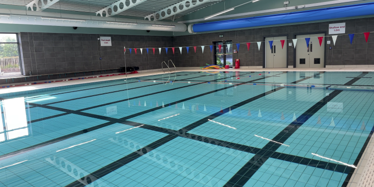 An empty brand new indoor swimming pool