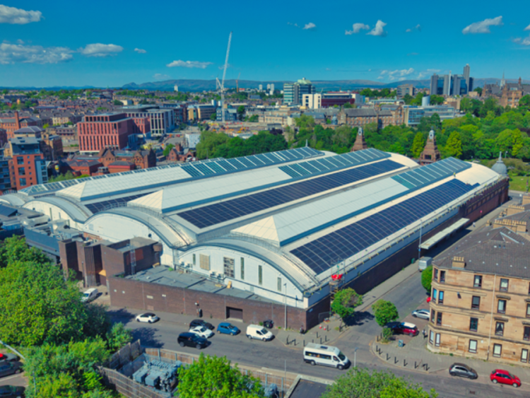 view of large historic building from above 