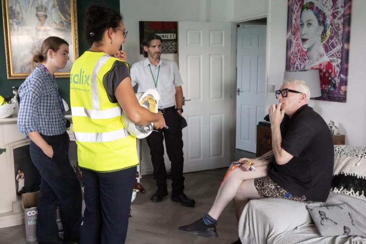 Team Salix (Finance and Homes) with resident Shaun